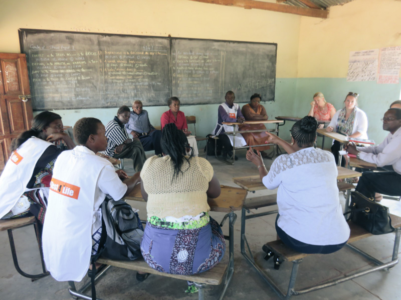 CHWs having focus group discussions with various stakeholders