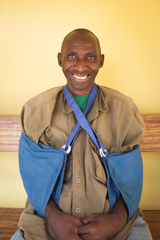 Cairo Situlo, a CHW from Zimba, recovering from an automobile accident in September that broke both of his arms.