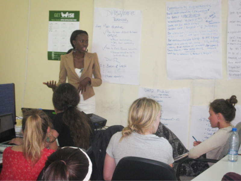 The students participating in a training at the Akros office.