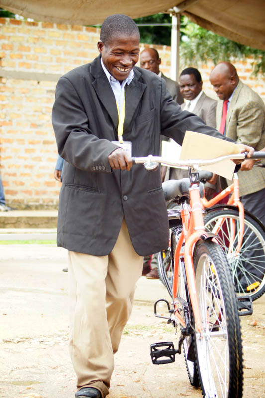 An excited CHW wheels away his new ride.