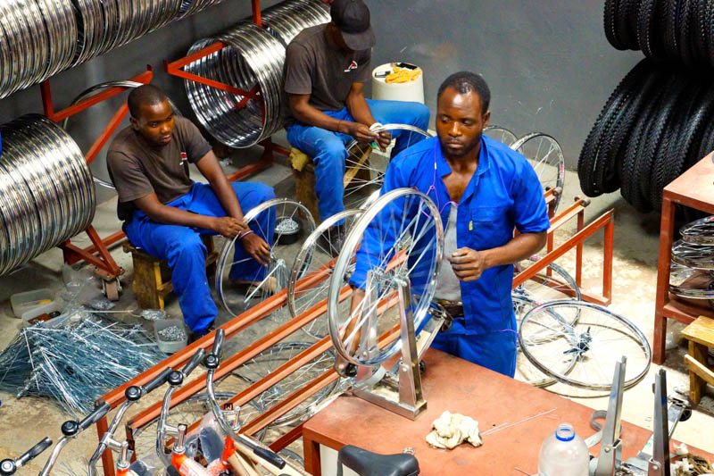 Assembling the bicycles at the Buffalo Bikes production center.